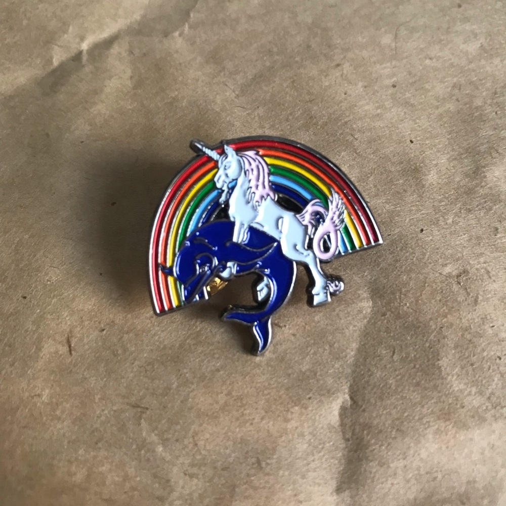 Unicorn Riding a Dolphin Rainbow Enamel Pin